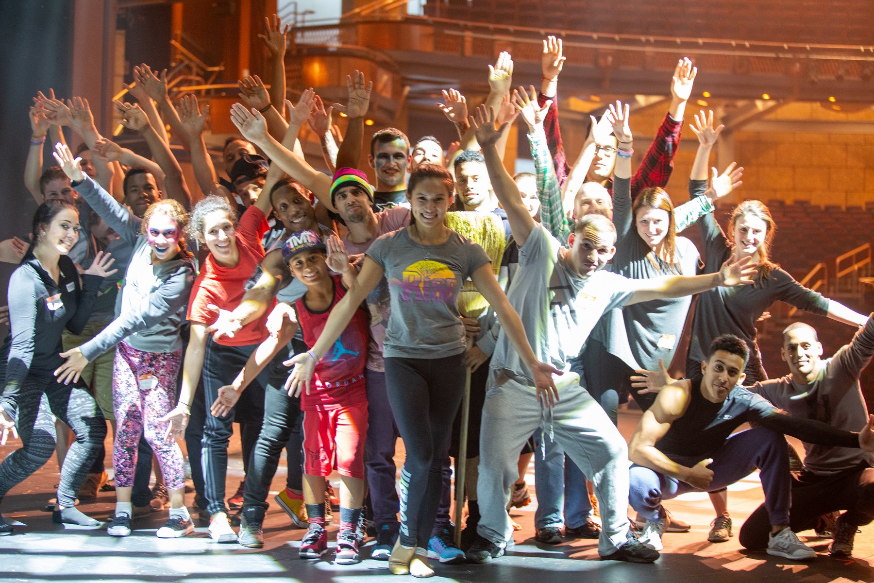 The cast of RISE, An Acrobatic Play on stage